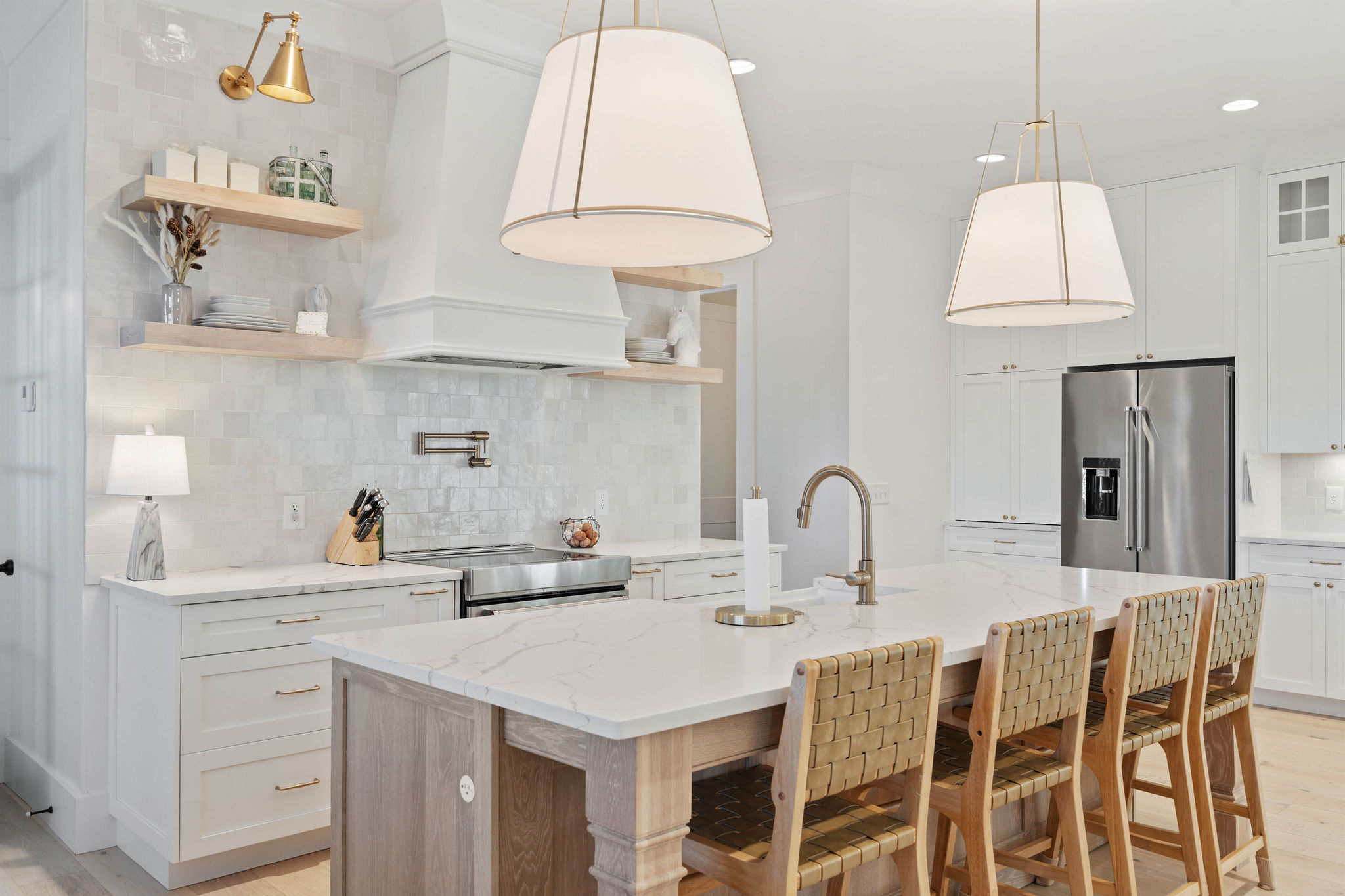 Oak island and warm metal details in a Southern Oak kitchen